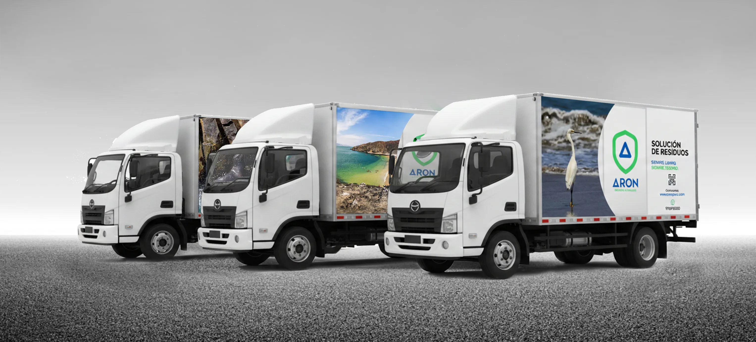 Flota de camiones de Aron Perú rotulados con el logo de la empresa